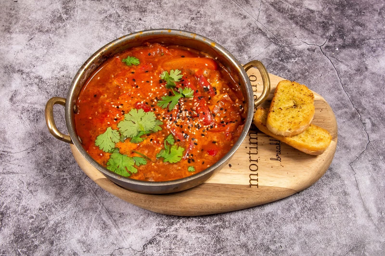 Prawn casserole in tomato and coconut sauce